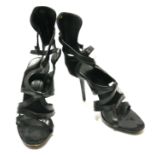 BALENCIAGA, A PAIR OF BLACK LEATHER AND SUEDE OPEN TOE STRAP WORK HEELS (size 39). Condition: B