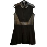 THE KOOPLES, BLACK SLEEVELESS SKATER STYLE DRESS With leather detail and collar (size M). Condition: