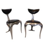 MARK BRAZIER-JONES, B. 1956, A PAIR OF LIMITED EDITION POLISHED ALUMINIUM DOLPHIN TAIL CHAIRS