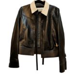 VALENTINO, BLACK LEATHER JACKET With zip detail to sleeves and white leather collar (size 42).