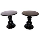 A PAIR OF EBONISED OCCASIONAL TABLES With circular tops on bulbous turned columns on platform bases.