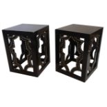 A PAIR OF EBONISED SIDE TABLES The pierced bases with chrome stud work ex Harrods. (41cm x 41cm x