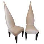 ALLEGRA HICKS, A STYLISH PAIR OF CREAM OSTRICH SKIN LEATHER CHAIRS With pointed arch backs