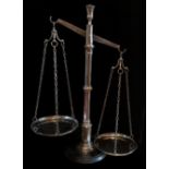 A LARGE PAIR OF POLISHED CHROME BALANCE SCALES With a single column on platform base. (w 66cm x h