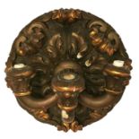 A LARGE 18TH/19TH CENTURY ITALIAN CARVED GILT WOOD THREE BRANCH WALL APPLIQUÉ. (diameter 62cm)