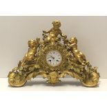 MOTTU FRES PARIS, A FINE GILDED BRONZE CASED MANTLE CLOCK With three putti picking grapes above a