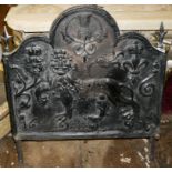 AN ANTIQUE CAST IRON FIRE BACK Cast with a rampant lion with fluer de lis, rise and thistle, dated