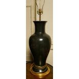 A LARGE GREEN CERAMIC BALUSTER VASE Converted to a table lamp. (94cm)