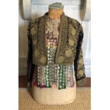 AN EARLY/MID 20TH CENTURY SPANISH MATADORS COAT With gilt embroidered scrolled Boteh decoration,