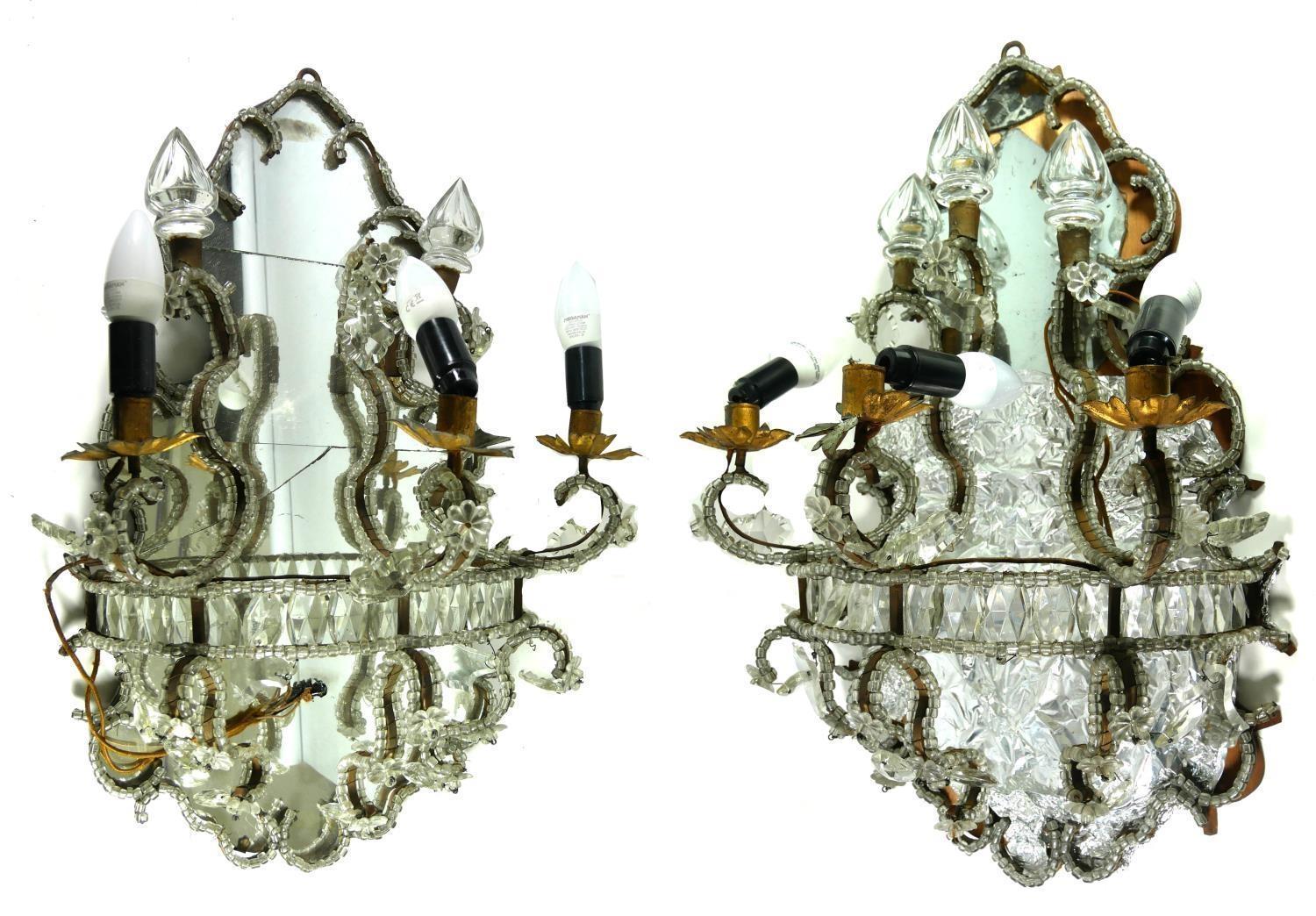 A PAIR OF VENETIAN THE BRANCH WALL SCONCES With ogee mirrored backs surrounded by glass beads and