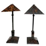 A PAIR OF ART DECO DESIGN LAMPS With faux tortoiseshell shades and tiled decoration, raised on a