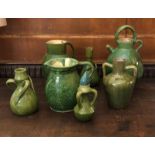 A COLLECTION OF HIGH FIRED STUDIO POTTERY To include jugs and vases. (largest 41cm)