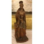 A 20TH CENTURY CARVED WOOD FIGURE OF SEATED MADONNA AND CHILD WITH ANGEL ALONGSIDE Signed 'G. Lang',