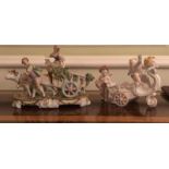 TWO EARLY 20TH CENTURY CONTINENTAL CENTREPIECES Cherubs and chariot, courting couple with cart. (