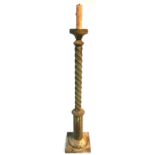 A REGENCY STYLE COPPER STANDARD LAMP The turned and reeded column on a platform base.