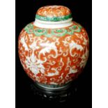 A LATE 19TH/EARLY 20TH CENTURY CHINESE GINGER JAR AND COVER Hand painted scrolled decoration on