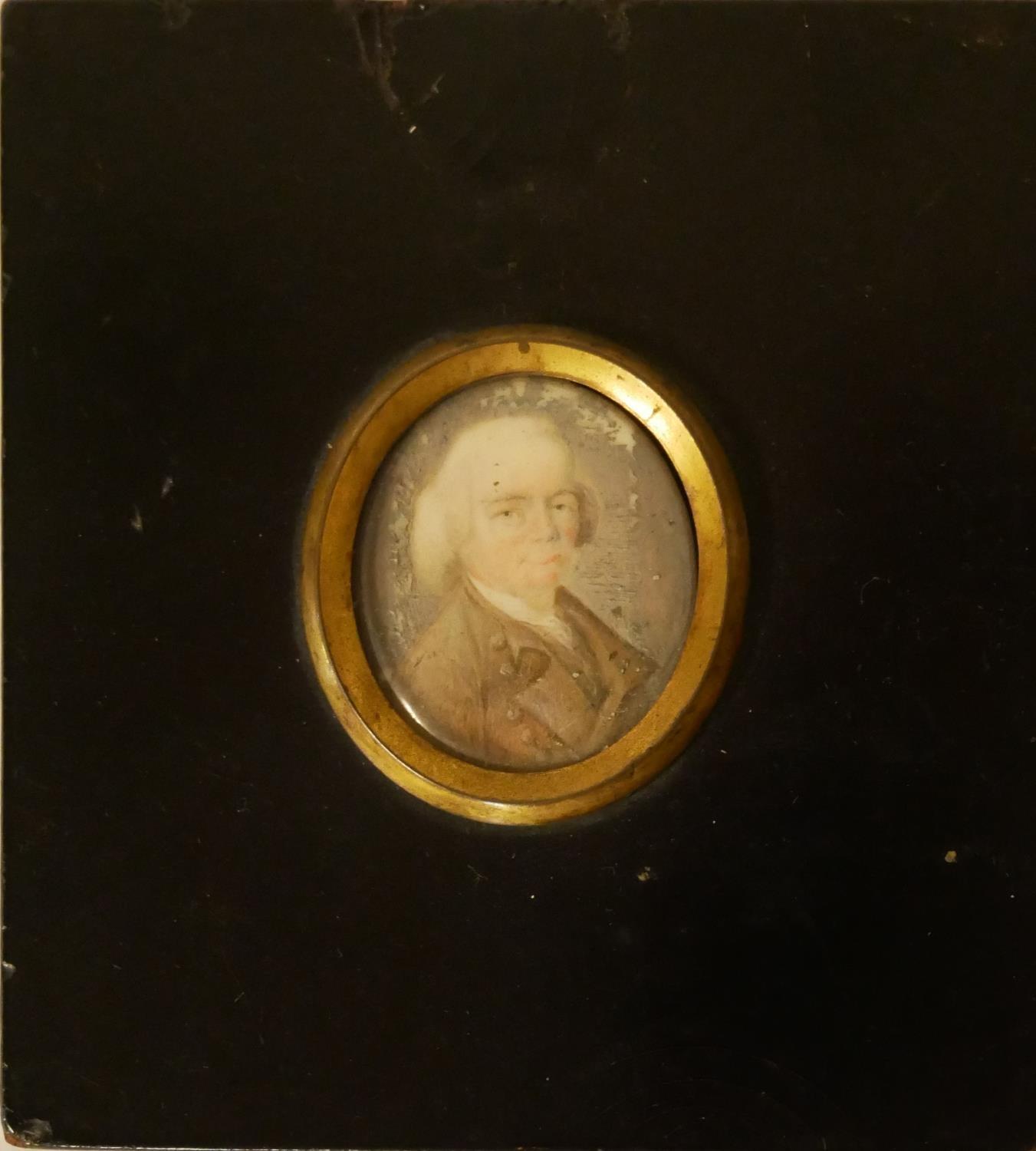 AN 18TH CENTURY MINIATURE OVAL PORTRAIT OF A GENTLEMAN On mother of pearl, in an ebonised frame. (