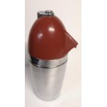 A VINTAGE AMERICAN STAINLESS STEEL AND RED ENAMELLED SODA MAKER Walter Kidde, designed by Norman