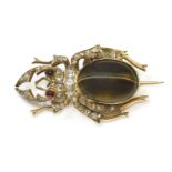 A Victorian gold diamond and tiger's eye stag beetle brooch,the abdomen formed from an oval cabochon