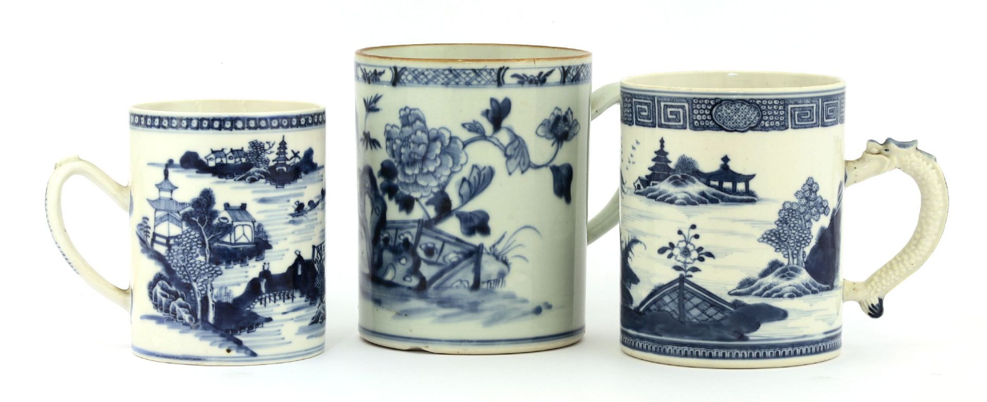 Three Chinese blue and white tankards,18th century, of cylindrical shape, two painted with watery