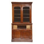 A Victorian mahogany secretaire bookcase,with a moulded cornice over two glazed doors, a