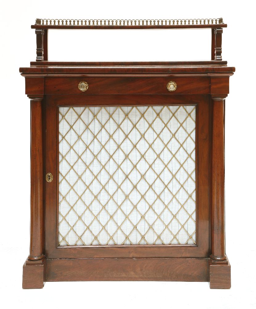 A Victorian mahogany chiffonier,the low raised shelf with a brass gallery, on carved front