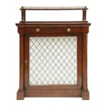 A Victorian mahogany chiffonier,the low raised shelf with a brass gallery, on carved front
