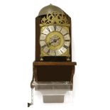 A brass lantern clock, the dial signed 'Gulielmus Clement', the strapped bell over three engraved