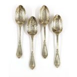 A set of four Victorian Grecian pattern silver serving spoons,by George Adams, London 1868, with '