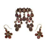 A late Georgian garnet set girandole drop brooch, composed of a series of oval, round and pear-