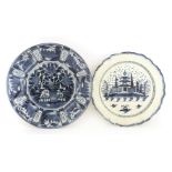 A pearlware charger,early 19th century, painted with a pagoda and trees beside a river, within a