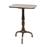 A George III mahogany tripod table,the rectangular top on a turned column and downswept legs,top