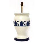 A pottery vase table lamp,20th century, with a band of blue 'jasper' decoration on a turned wood