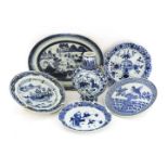 A group of Chinese blue and white porcelain:a charger,19th century, painted with a watery