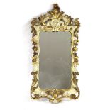 A carved wood and painted Venetian wall mirror, early 20th century,124cm high