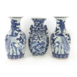 A pair of Chinese blue and white baluster vases,20th century,45cm high, andanother,43cm high (3)