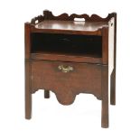 A George III mahogany night commode,with a shaped tray top over a shelf and commode drawer,61cm