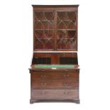 A George III strung mahogany bureau bookcase,having a dentil cornice over an inlaid frieze and