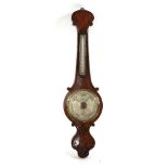 A Victorian flame veneered mahogany wheel barometer,the silvered dial inscribed 'A Casartelli,