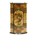 A bow-fronted hanging corner cupboard,with all-over painted decoration,48.5cm wide87cm high