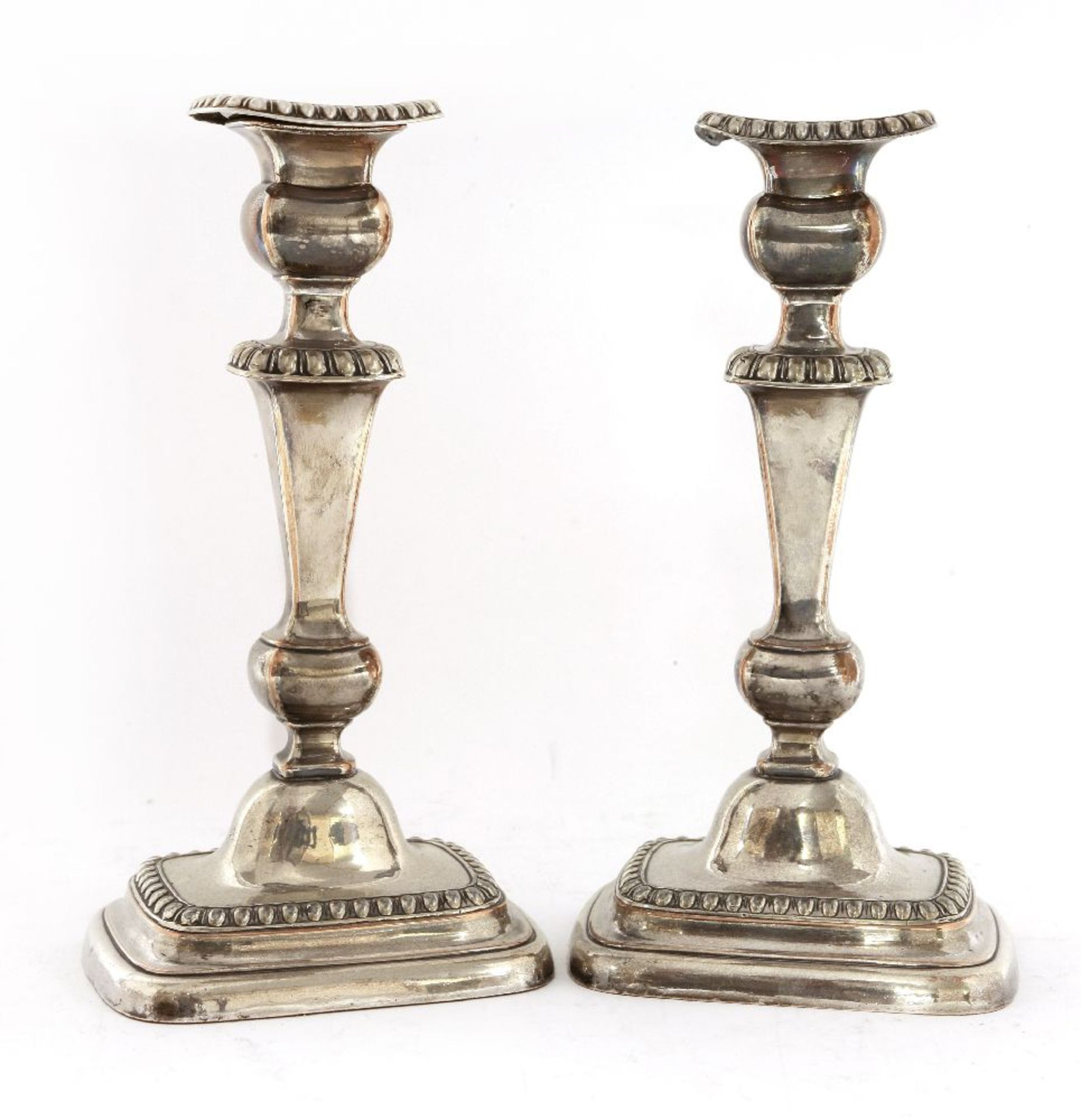 A pair of old Sheffield plate candlesticks,first quarter of the 19th century, of rectangular form
