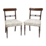 A pair of George III strung mahogany bar back single chairs,on reeded and turned front legs (2)