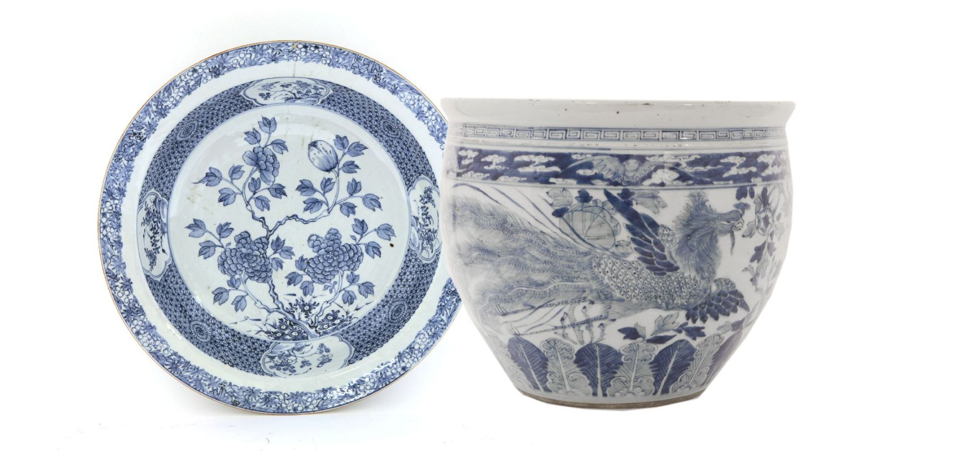 A Chinese blue and white planter,19th century, of tapering form, painted with phoenixes amongst