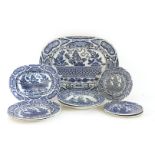 A pottery blue and white platter,early 19th century,45cm long, andfive plates, two bowls and one