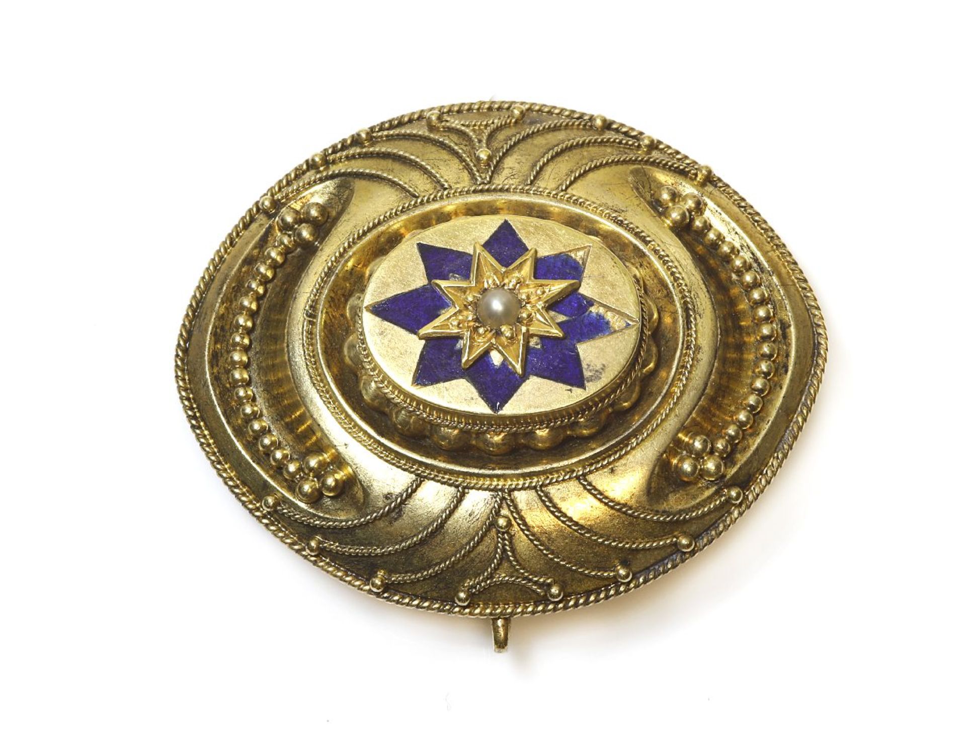 A Victorian gold Etruscan Revival style shield brooch, c.1860,a raised boss, star set, single