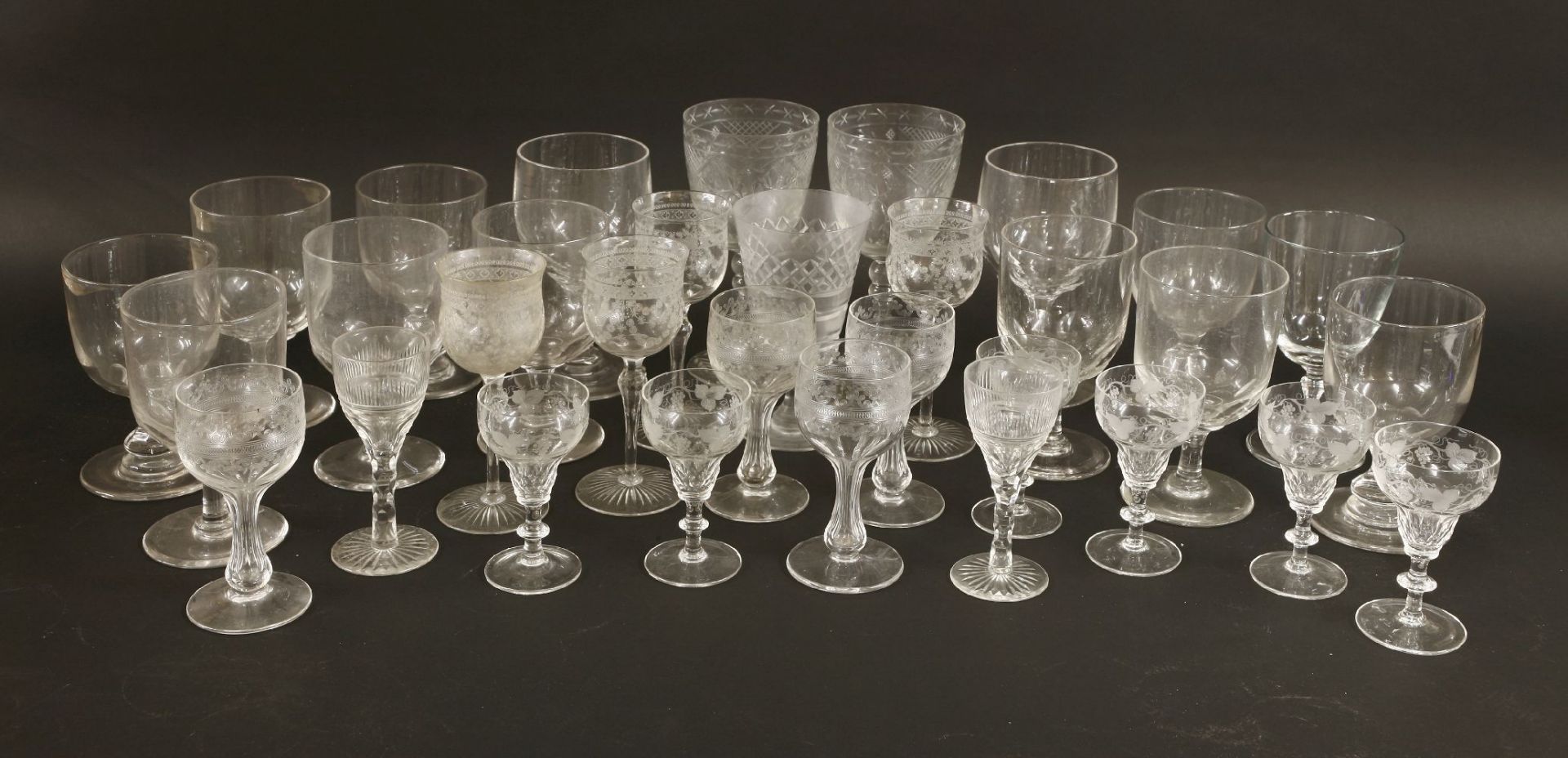 A collection of drinking glasses,with cut and etched decoration (qty.)