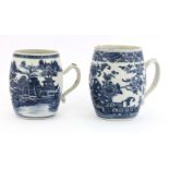 Two Chinese blue and white tankards,18th century, of barrel form, one painted with a watery