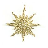 A split pearl starburst brooch, a cluster of split pearls to the centre and further split pearls set