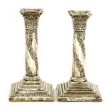 A pair of Edwardian corinthian column candlesticks, Walter Latham and Son, Sheffield, 1906,