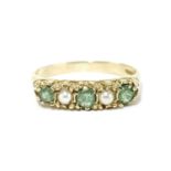 A 9ct gold five stone graduated emerald and cultured pearl ring, to a scrolling gallery and plain